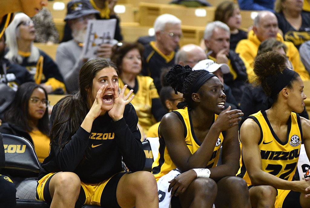 Micah Linthacum cheers on her team